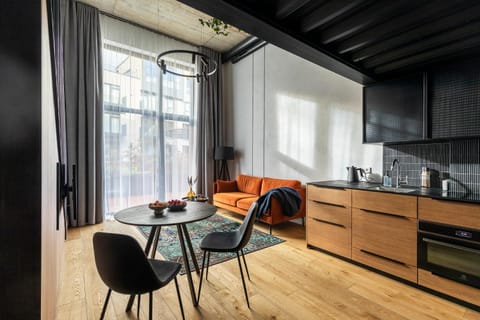 Kitchen or kitchenette, Living room, Seating area, Dining area