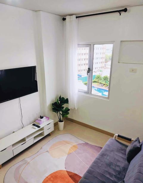 TV and multimedia, Living room, Seating area, Pool view, Swimming pool
