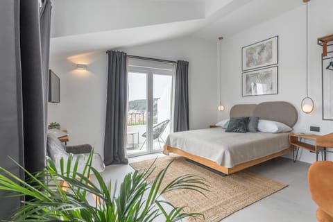 Bed, Seating area, Bedroom