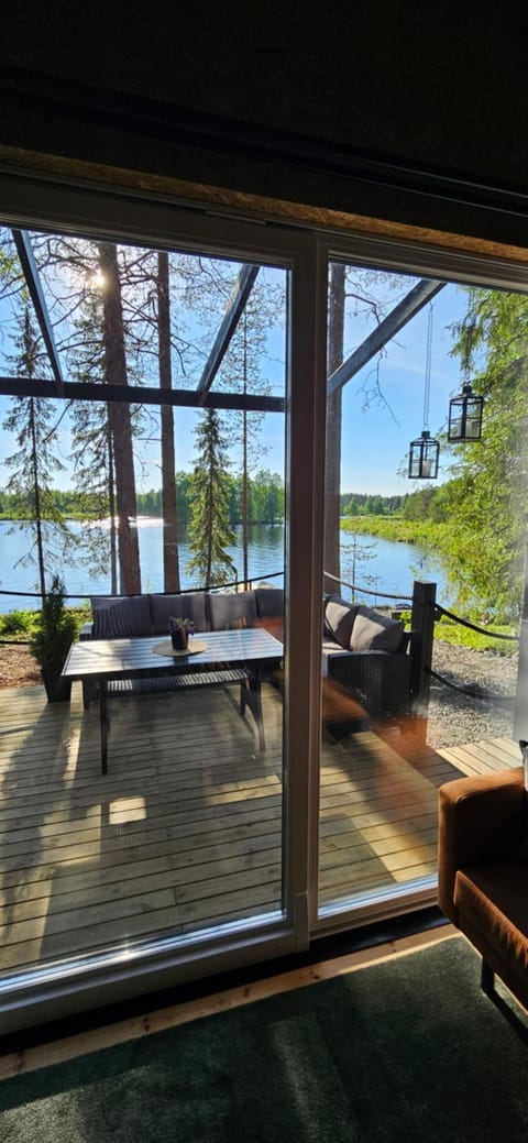 Patio, View (from property/room), Living room, Seating area, River view