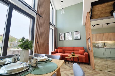 Kitchen or kitchenette, Living room, Seating area, Dining area