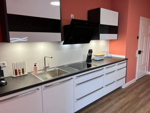 Kitchen or kitchenette, dishwasher, stove, kitchen