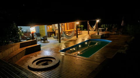 Patio, Night, Pool view, Swimming pool, sunbed