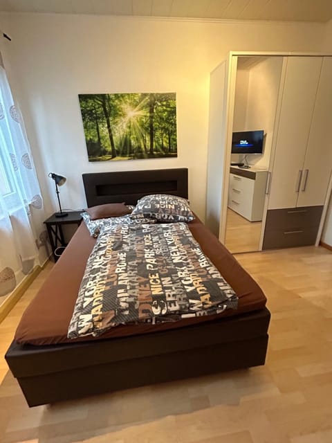 Bed, wardrobe