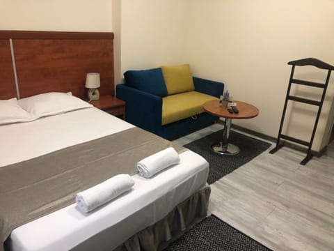 Bed, Photo of the whole room, Seating area, towels