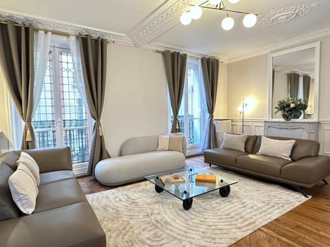 View (from property/room), Living room, Decorative detail, Seating area, City view, Street view, Quiet street view