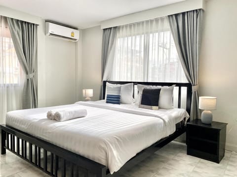 Bed, Photo of the whole room, Bedroom, towels, air conditioner