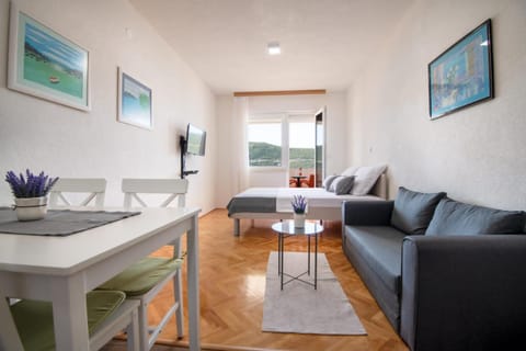 Bed, Seating area, Bedroom, Sea view