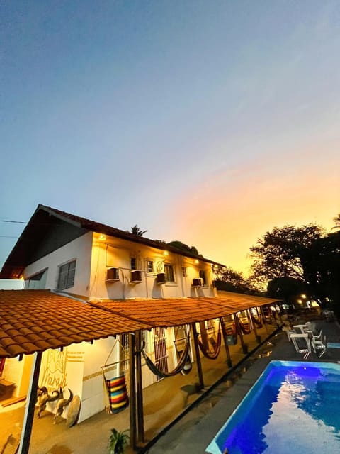 Property building, Day, Pool view, Swimming pool, Swimming pool, Sunset, sunbed