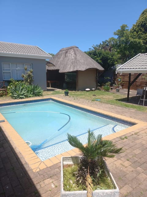 Property building, Pool view, Swimming pool, sunbed