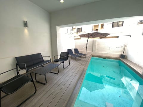 Seating area, Pool view, Swimming pool, sunbed