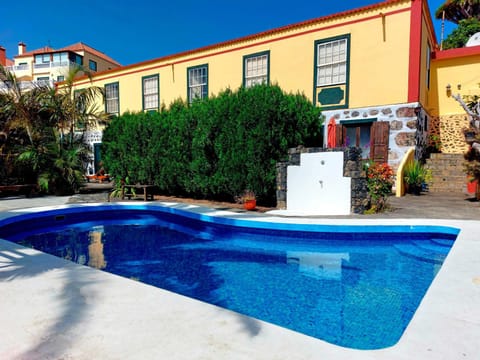 Property building, Pool view, Swimming pool, sunbed