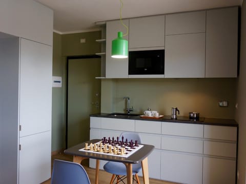 Kitchen or kitchenette, Dining area, stove