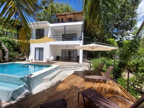 Property building, Patio, Day, Natural landscape, Garden, View (from property/room), Balcony/Terrace, Garden view, Pool view, Swimming pool, sunbed