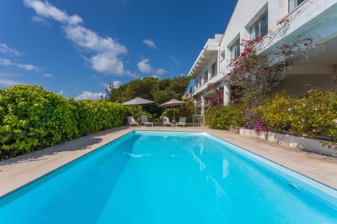 Property building, Living room, Swimming pool