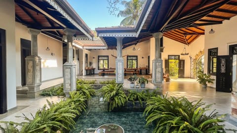 Property building, Patio, Seating area, Dining area
