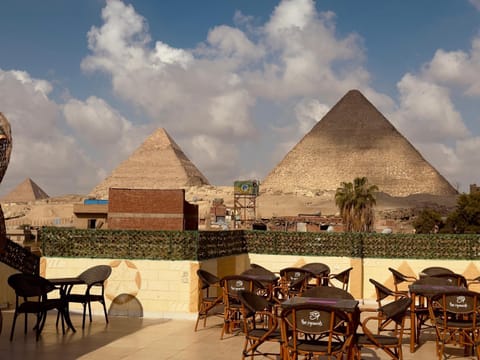 Property building, Patio, Nearby landmark, Day, Landmark view, group of guests