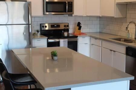 Onsite coffee bar just mins to Jack Thrice Stadium Apartment in Ames