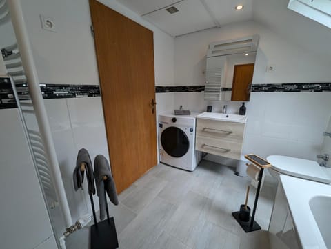 Bathroom, towels, washing machine, dryer