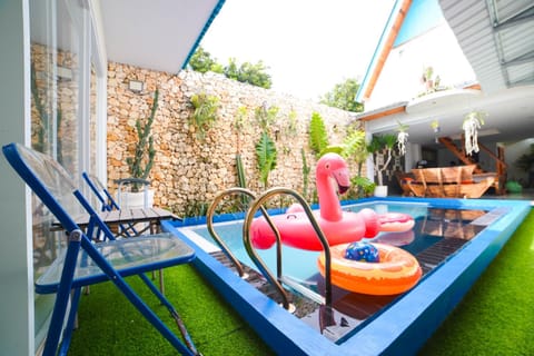 Seating area, Garden view, Pool view, Swimming pool