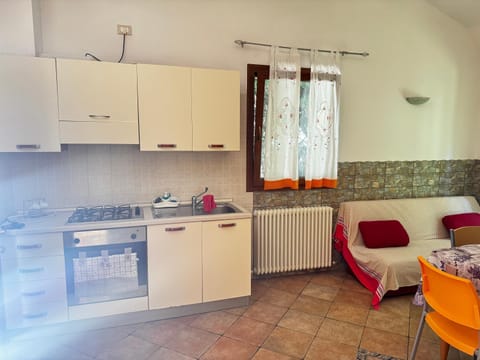 Kitchen or kitchenette, stove