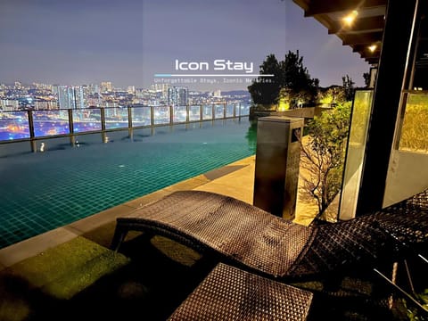 Night, View (from property/room), City view, Pool view, Swimming pool, sunbed