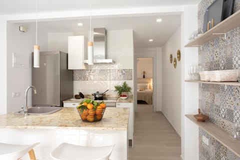 Kitchen or kitchenette, oven, stove