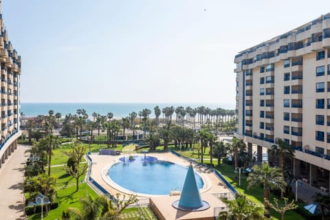 Property building, Nearby landmark, Day, Natural landscape, Pool view, Sea view, Swimming pool