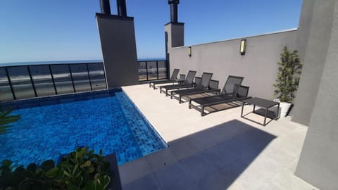 View (from property/room), Balcony/Terrace, Pool view, Swimming pool, sunbed