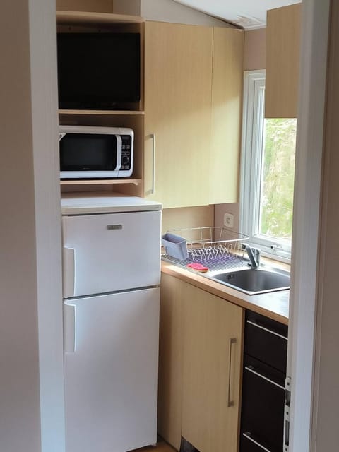 Kitchen or kitchenette, stove, kitchen