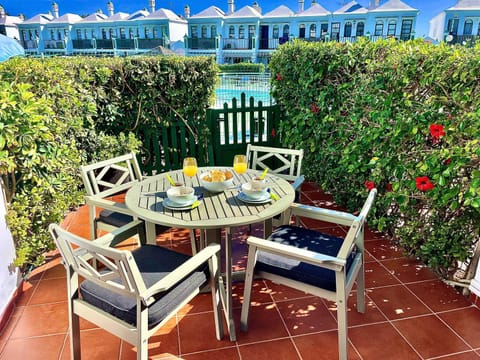 Property building, Patio, Day, Garden, View (from property/room), Balcony/Terrace, Dining area, Garden view, Pool view, Swimming pool