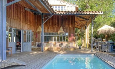 Property building, Pool view, Swimming pool, sunbed