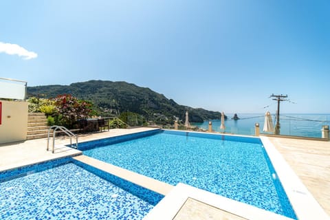 Property building, Living room, Swimming pool