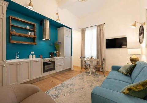 TV and multimedia, Kitchen or kitchenette, Living room, Seating area, stove