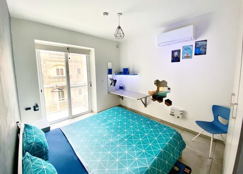 Property building, Bed, Photo of the whole room, Decorative detail, Seating area, Bedroom, hair dresser, hair dryier, wardrobe, air conditioner