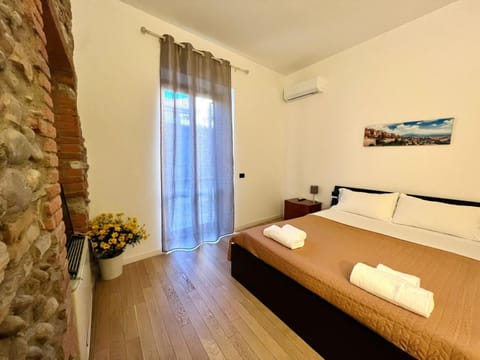 Bed, Photo of the whole room, Bedroom, towels, air conditioner