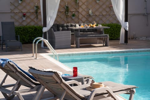 Patio, Day, Pool view, Swimming pool, sunbed