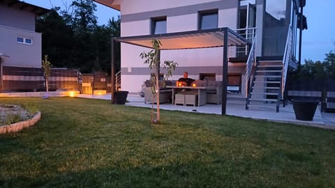 Property building, Patio, Night, BBQ facilities, Garden view