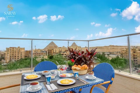 Patio, Day, Natural landscape, View (from property/room), Balcony/Terrace, Food and drinks, Dining area, Food, City view