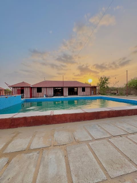 Property building, Pool view, Swimming pool, Swimming pool, Sunset