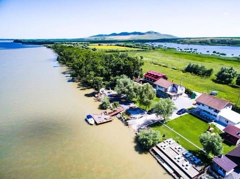 Property building, Nearby landmark, Natural landscape, River view