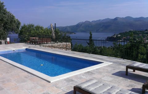 Patio, BBQ facilities, Balcony/Terrace, Pool view, Sea view, Swimming pool, Swimming pool, young children, older children, Family