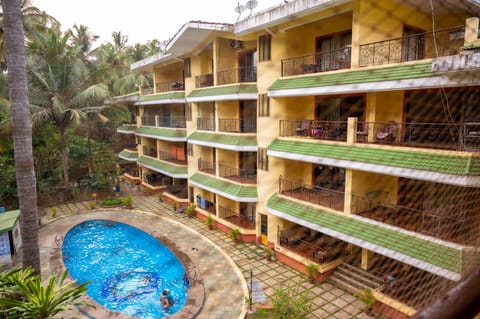 Property building, Day, Garden, View (from property/room), Balcony/Terrace, Pool view, Swimming pool