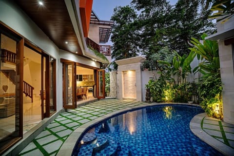 Property building, Patio, Pool view, Swimming pool, sunbed
