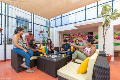 Communal lounge/ TV room, People, Seating area, Evening entertainment