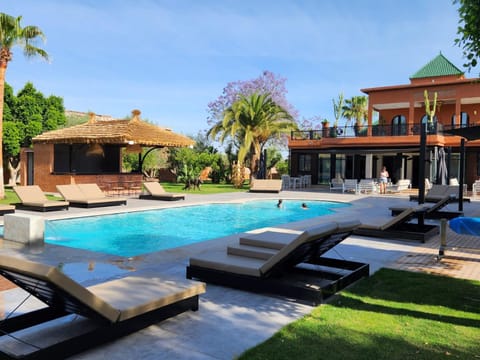 Patio, Natural landscape, Garden, Garden view, Pool view, sunbed