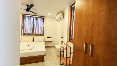 Bed, Living room, Photo of the whole room, Seating area, Bedroom, wardrobe, air conditioner
