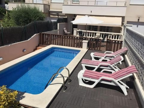 Property building, Living room, Swimming pool