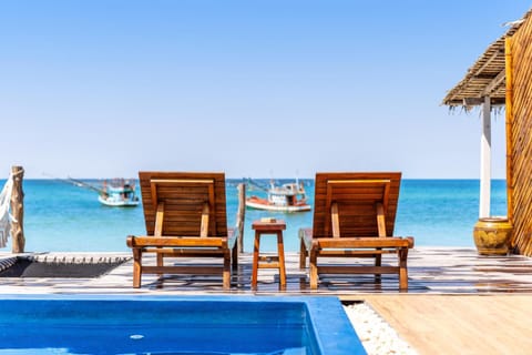 Patio, Day, Natural landscape, Seating area, Beach, Pool view, Sea view, Swimming pool, sunbed