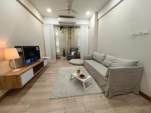 TV and multimedia, Living room, Seating area, fireplace, air conditioner